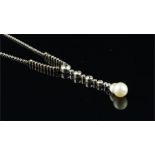 Edwardian baroque pearl and diamond necklace, 13 x 8mm baroque pearl suspended from a drop of old