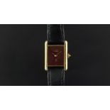 *TO BE SOLD WITHOUT RESERVE* LADIES' MUST DE CARTIER VERMEIL WRISTWATCH, rectangular maroon dial