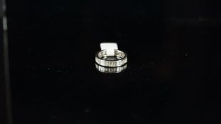 Diamond full eternity ring, baguette cut diamonds weighing an estimated total of 2.60ct, set in