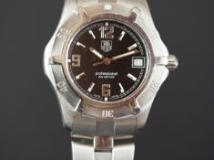 GENTS TAG HEUER PROFESSIONAL WRISTWATCH REF. WN1110-0, circular black dial with silver hour