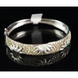 Diamond set bangle, wide diamond set panel with sun detail, set with yellow and white round