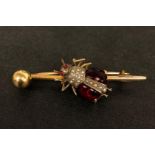 Garnet and pearl bug brooch, on a yellow metal bar brooch, tested as 9ct, measures approximately