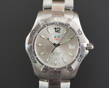 GENTS TAG HEUER PROFESSIONAL REF. WAF 1112, circular two tone silver dial with luminous hour markers