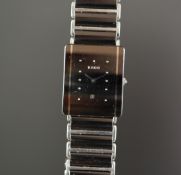 GENTS RADO DIASTAR WRISTWATCH, rectangular black diamond dot dial with date aperture, 27x 32mm