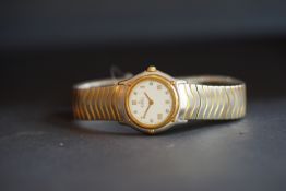 LADIES' EBEL DIAMOND DIAL WRISTWATCH REF. 1090121, circular white dial with gold Roman numerals