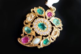 A gem set pendant, set with pink, green and pale yellow gemstones, and round brilliant cut diamonds,
