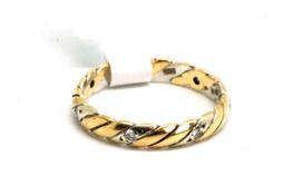 9ct tri-colour gold wedding band, set in a twist design with a repeating pattern of yellow, rose and