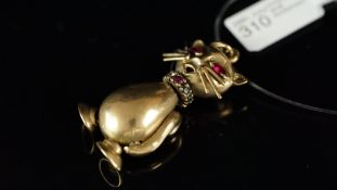 Gem set cat brooch, with marquise ruby eyes and a ruby diamond and sapphire collar, mounted in 9ct