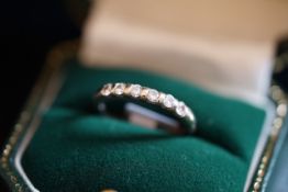 Diamond half eternity ring, round brilliant cut diamonds weighing an estimated total of 0.40ct,