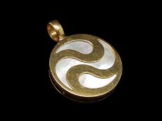 Bvlgari pendant, mother of pearl inlay with gold yin yang style design spinner, 18ct yellow gold