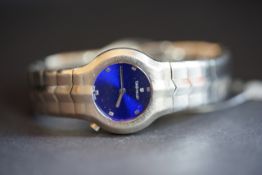 LADIES' TAG HEUER WRISTWATCH REF. WAA1410, circular blue dial with silver hands, 26mm stainless