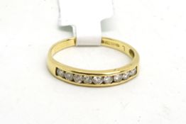 Diamond half eternity ring, nine round brilliant cut diamonds weighing an estimated total of 0.25ct,