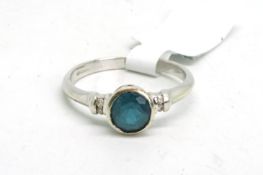 Single stone tourmaline ring, round cut bluish green tourmaline, with two small round brilliant