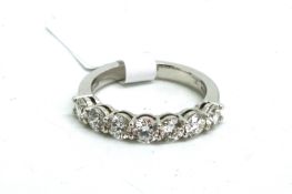 Seven stone diamond ring, seven round brilliant cut diamonds, weighing an estimated total of 1.10ct,