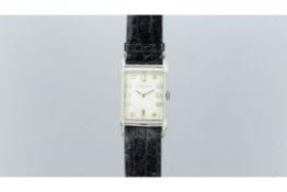 A RARE GENTLEMEN'S PLATINUM VACHERON & CONSTANTIN WRISTWATCH, silver dial with original diamond