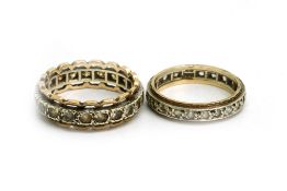 Two paste full eternity rings, set in silver and gold