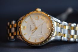 MID SIZE TISSOT POWERMATIC 80 WRISTWATCH, circular mother of pearl two tone dial with gold hour