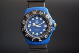 MID SIZE TAG HEUER FORMULA 1 PROFESSIONAL WRISTWATCH REF. 381.513/1, circular blue dial with