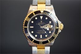 GENTLEMEN'S ROLEX OYSTER PERPETUAL DATE SUBMARINER, black dial with luminous hour markers, black