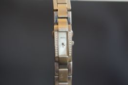 LADIES' GUCCI 4600L DIAMOND SET WRISTWATCH, rectangular mother of pearl dial with silver hands,