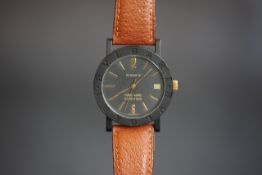 MID SIZE BVLGARI AUTOMATIC HONG KONG WRISTWATCH, circular black dial with gold hour markers and date