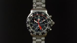 GENTLEMEN'S TAG HEUER PROFESSIONAL CHRONOGRAPH REF. CA1211-1, circular two tone black triple