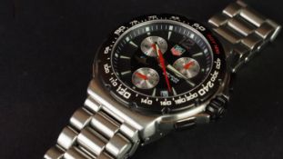 GENTLEMEN'S TAG HEUER INDY 500 CHRONOGRAPH WRISTWATCH REF. CAC111A, circular black dial triple