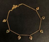 Gem set acrostic necklace, with seven gem set heart pendants, the hearts spelling 'Dearest' using