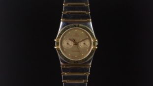 MID SIZE OMEGA CONSTELLATION CALENDAR WRISTWATCH, circular brown/gold twin register date aperture