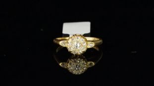 Victorian diamond cluster ring, central daisy cluster of old cut diamonds and a diamond set to