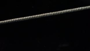 Diamond line bracelet, round brilliant cut diamonds weighing an estimated total of 3.00ct, claw