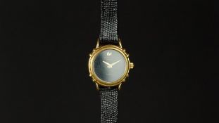 LADIES' RAYMOND WEIL WRISTWATCH, round black dial, gold plated case, on a black leather strap and