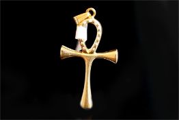 A gold ankh Egyptian cross pendant, with diamond detail to the loop, with Egyptian hallmarks,