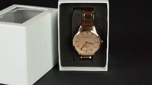 LADIES' KAREN MILLEN WRISTWATCH W/BOX, circular pink dial with a dial and hour markers, 32mm