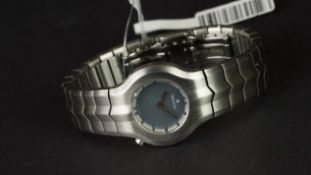 LADIES' TAG HEUER ALTER EGO, 23mm case, round black mother of pearl dial, stainless steel case,