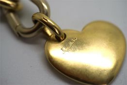 Pomellato 18ct gold necklace, oval heavy links, with a gold heart charm signed Pomellato, chain