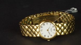 LADIES' RAYMOND WEIL WRISTWATCH, circular white dial with Roman numeral hour markers,19mm gold