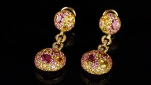 Sapphire and diamond drop earrings, designed as two circular panels, set with pink, orange, yellow
