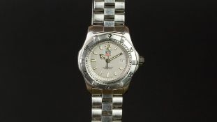 LADIES' TAG HEUER PROFESSIONAL WRISTWATCH, circular silver dial with luminous hour markers and a