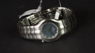 LADIES' TAG HEUER ALTER EGO, 23mm case, round black mother of pearl dial, stainless steel case,