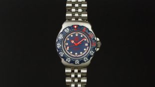 LADIES' TAG HEUER PROFESSIONAL WRISTWATCH, circular blue dial with luminous hour markers and a