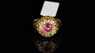 Burma ruby and diamond cluster ring, central round cut Burmese ruby, surrounded by rose cut