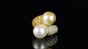 Pearl, yellow sapphire and diamond crossover ring, two 12.3mm pearls set in a crossover position,