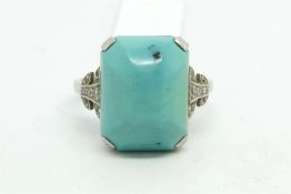 Turquoise and diamond ring, rectangular cut turquoise measuring 16 x 12mm, with diamond set