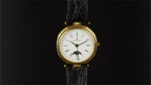 GENTLEMEN'S UNIVERSAL GENEVE MOONPHASE 18K GOLD WRISTWATCH, circular white dial with Roman numerals,