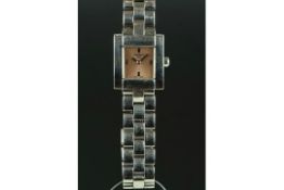 LADIES' TISSOT WRISTWATCH, square pink dial with silver hands and hour markers, 20mm stainless steel