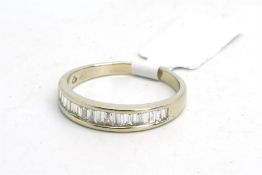 Diamond half eternity ring, set with baguette cut diamonds, mounted in white metal, finger size Q