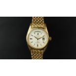 VERY RARE ROLEX DAY DATE 18K GOLD WRISTWATCH REF. 6611, circular off white dial with gold hands