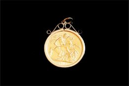 George V full sovereign, dated 1912, in a 9ct yellow gold pendant mount, hallmarked Birmingham 1984,