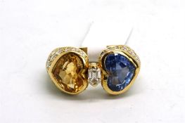 Sapphire and diamond ring, set with a blue heart cut sapphire and a yellow heart shaped citrine, set